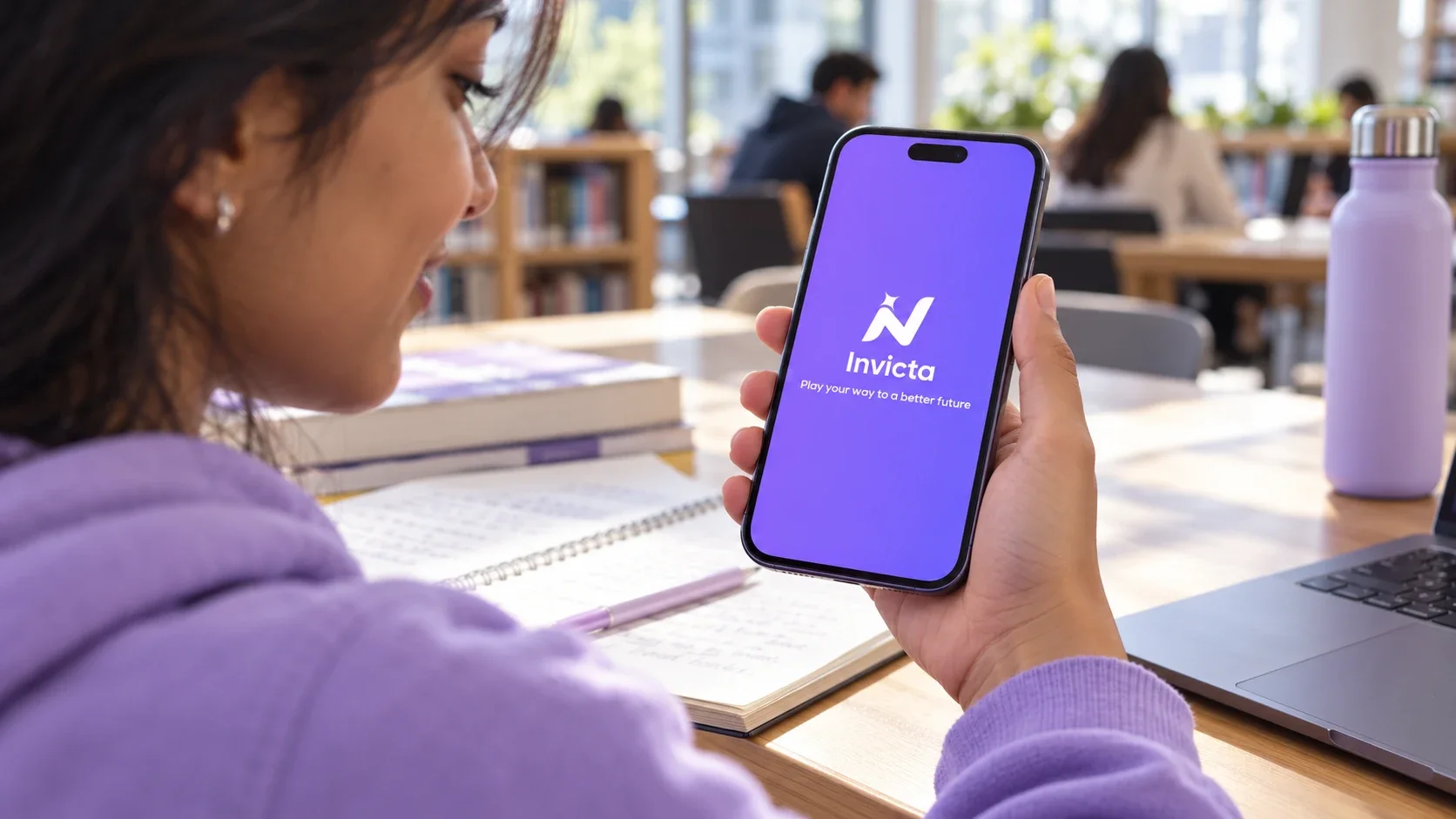 A student opening the Invicta app