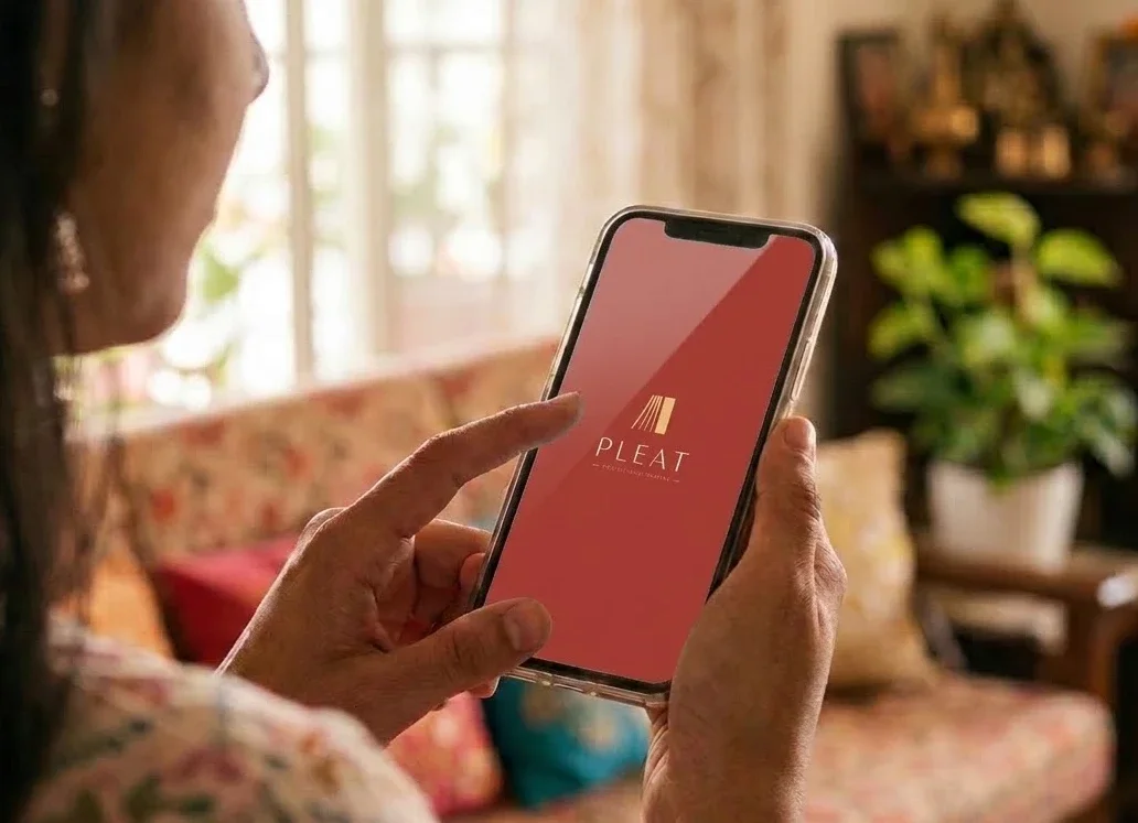 A customer opening the Pleat app at home