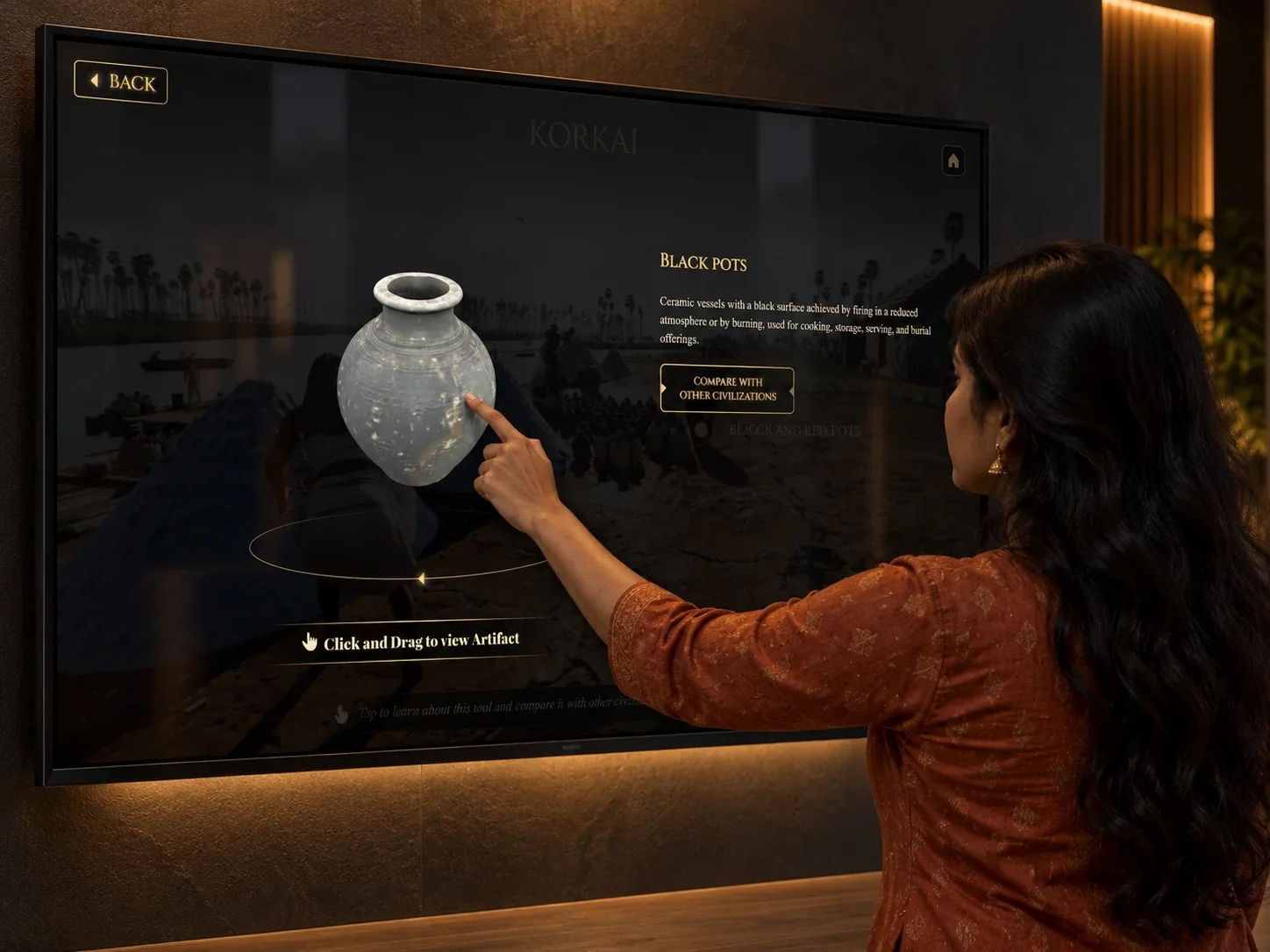 A visitor rotating a black pot in 3D